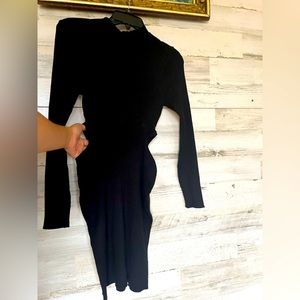 High neck sweater dress with side cutouts.NWT